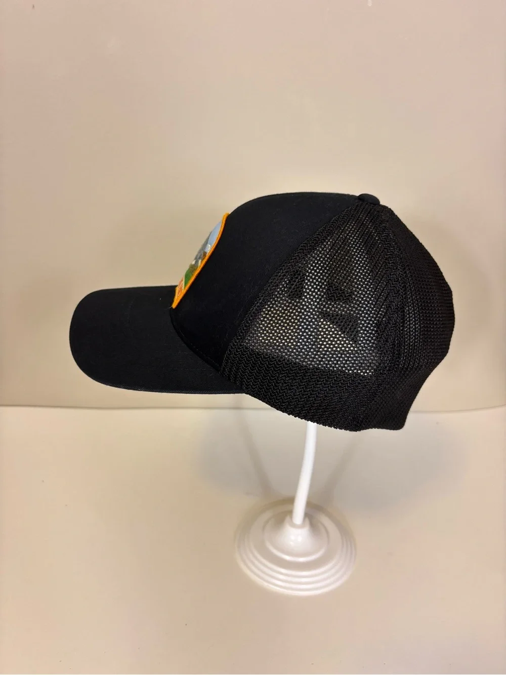 The North Face Black Trucker Hat with Orange-Trim Mountain Patch S/M
